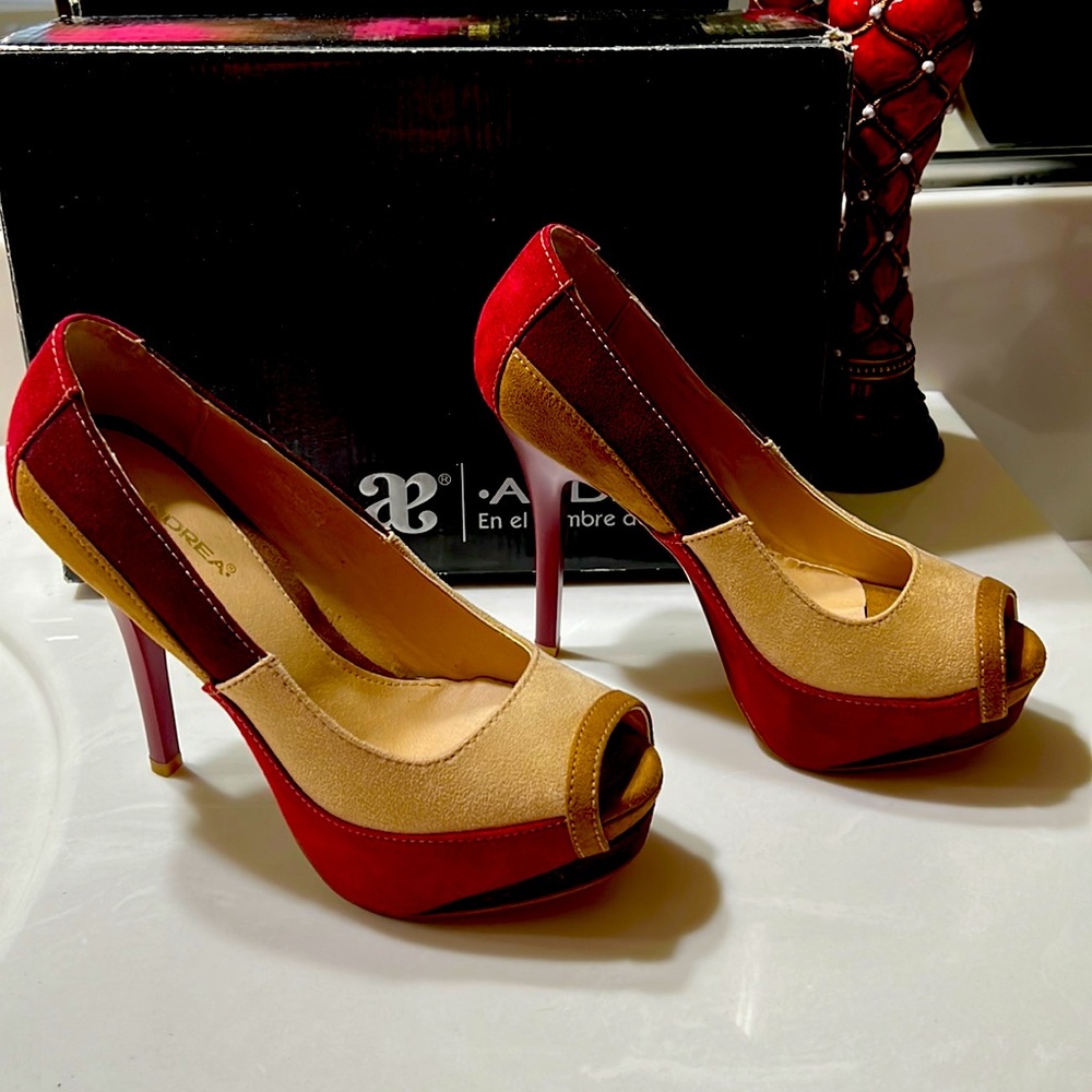 Heels ANDREA,color vino tex,size 7.5, with platform,new in good condition.
